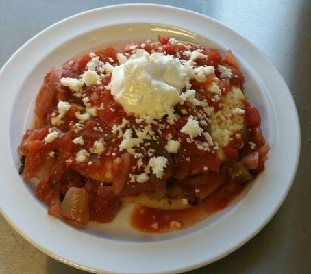 Pupusa Ranchera:two fry eggs,one Pupusa and homemade red wine Ranchera sauce:)mmmmm