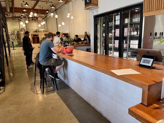 A nice long bar... with just four barstools.