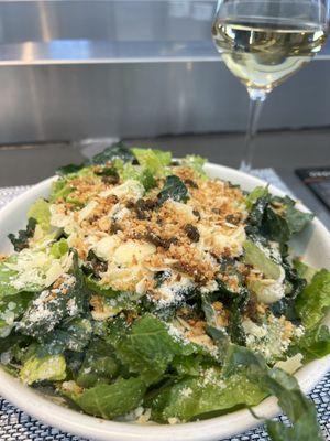 Kale salad and a glass of Reisling