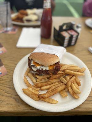 Buffalo chicken sandwich! Had already shared half my fries before taking the picture ‍