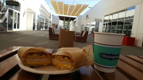 Breakfast sandwich and coffee from Cinnabon