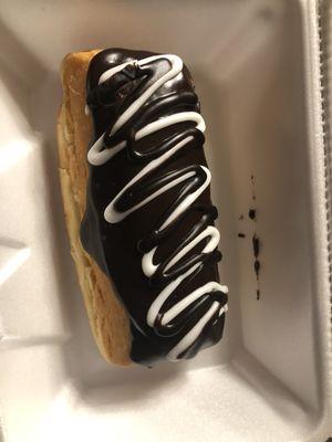 Chocolate eclair with vanilla cream