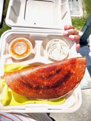 Dosa served in biodegradable box.