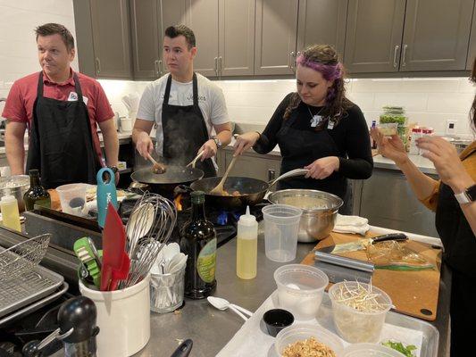 cooking the pad thai in the woks