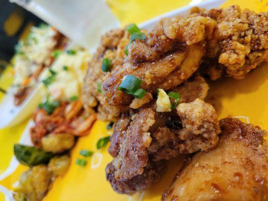 5 piece boneless chicken meal with honey butter sauce.  Brussel sprouts,  potato salad and kimchi