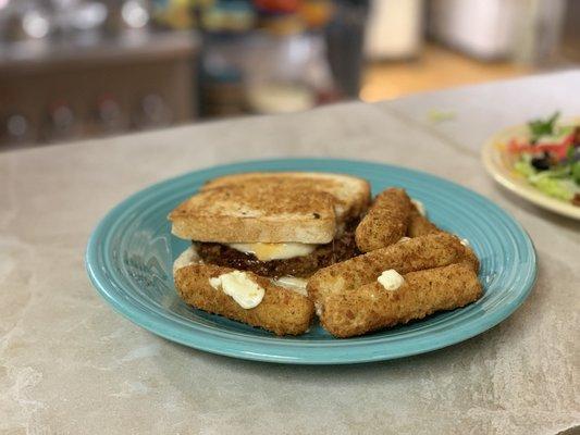 Mushroom and Swiss burger with mozzarella sticks Yum!