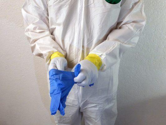 We have the right PPE for the most dangerous biohazard cleanups. Double gloving and taping keeps our technicians safe.