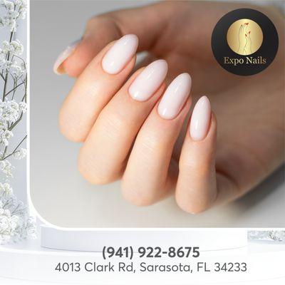 Almond nails polished to perfection--elegance at your fingertips!