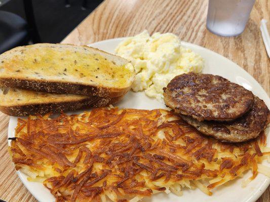 Egg whites, sausage, rye bread, and hash browns