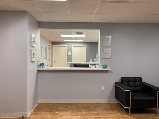 Our open and welcoming front desk. We don't hide from our patients.