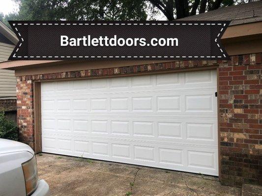 In stock garage door in white.