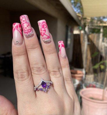 A set of gleaming Sterling Silver Chevron Rings, embossed with Amethyst, Rhodolite Garnet, Pink Quartz, and White Lab-Created Sapphire