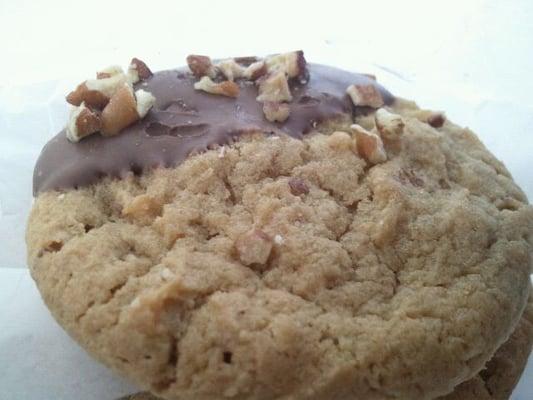 Chocolate dipped brown sugar pecan cookie