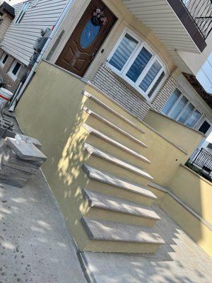 New steps and porch with a Custom seating area