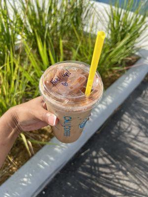 Iced Chai Latte with Oatmilk and Cinnamon powder