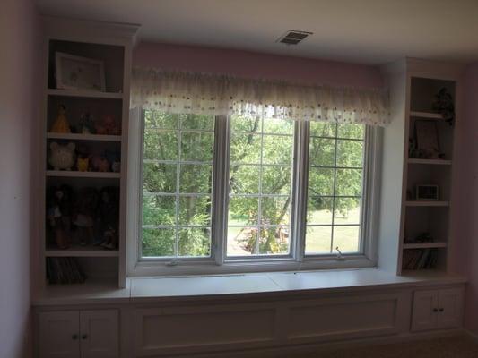 Custom bookshelves and toy chest for a little girl's room