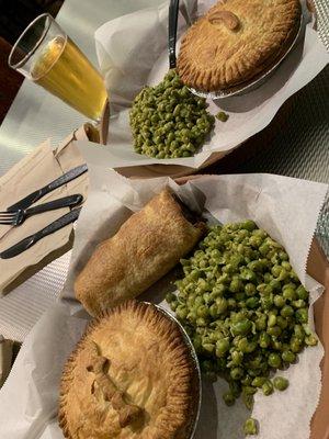 Great hot flaky fresh chicken and beef pot pies, sausage roll, mushy peas, and  Foster's lager beer!