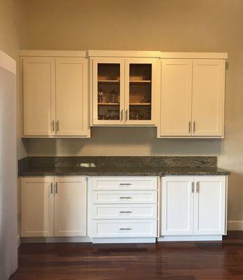 Buffet, dining area cabinets after reface.