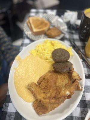 Cheese grits, fried flounder, sausage, eggs, toast