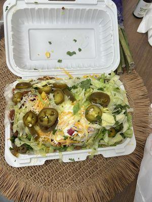 Chicken, rice, loaded with veggies, salsa and sour cream (like a chipotle burrito bowl but way better)