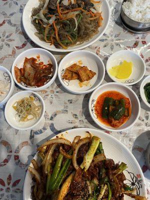 Chapchae (noodles) and Spicy Pork.  Plus all the extra pickled condiments.