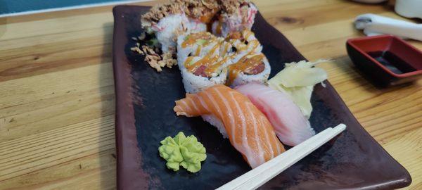 Combo A. Crunchy roll, spicy tuna roll, salmon and snapper nigiri