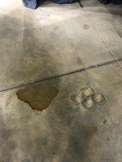 Black tar stains on the floor.