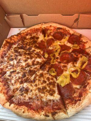 Half cheese, half pepperoni and banana peppers.