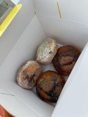 Nutella donut, matcha donut, and two matcha brûlée donuts.