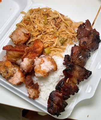 combo with pancit, lechon, and barbecue