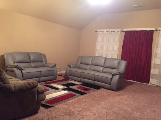 Leather recliner sofas and Rug!