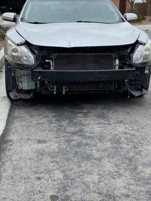 Beat up car sitting out front for weeks on end.