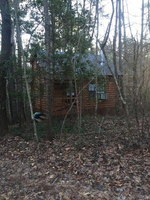 Our larger cabin overlooking our small lake.