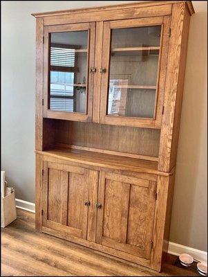 We move specialty items like this hutch cabinet by taking the time to pad wrap it!