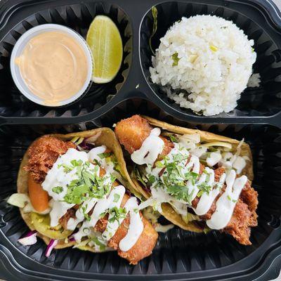 Fried Fish Tacos with a side of rice