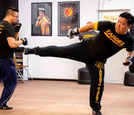 Learn Kickboxing for self-defense in our JKD group classes @ Tandez Academy.