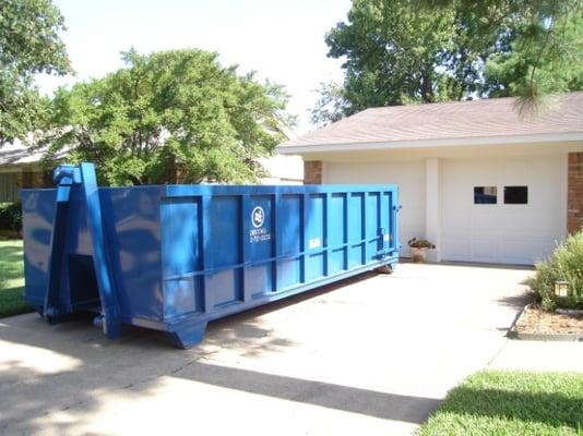 dumpster rental in the driveway