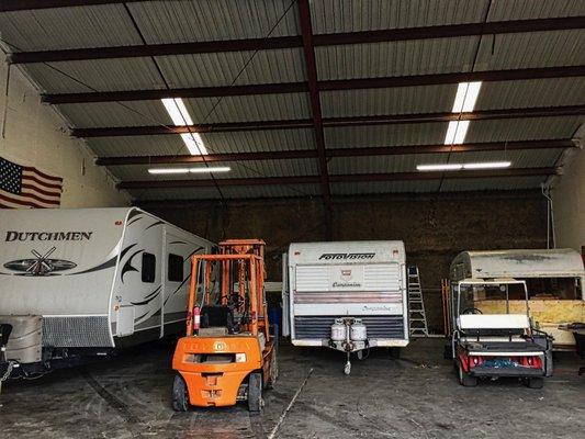 Discount RV & Trailer Repair's shop. The trailer on the far right is a vintage rig that he's restoring.