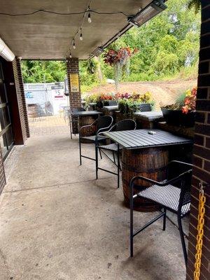 Front patio more outdoor seating to back left