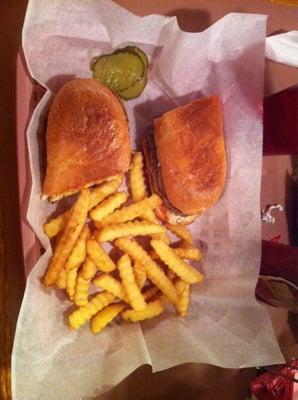 Steak hoagie and fries.