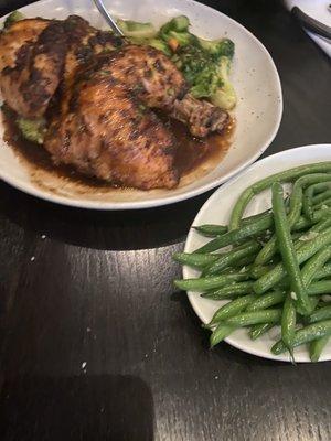 Half a chicken with a side of string beans