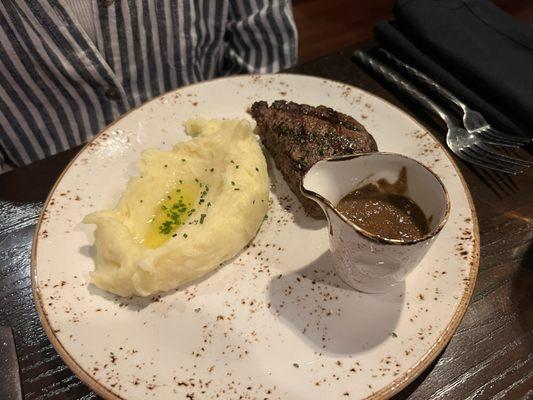 Filet mignon with spring onion/black garlic sauce and side of whipped potatoes