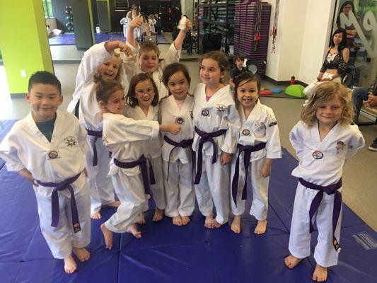 Welcoming the newest Purple Belt to the bunch!  There's so much love here!