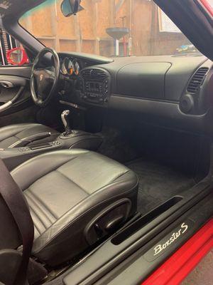 They'd just finished refurbishing the interior of this 20+ year old Boxster.