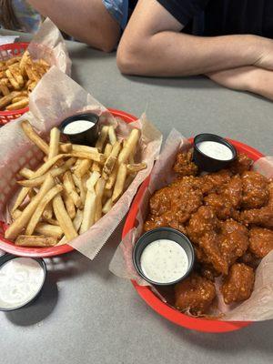 Buffalo garlic wings and regular fries