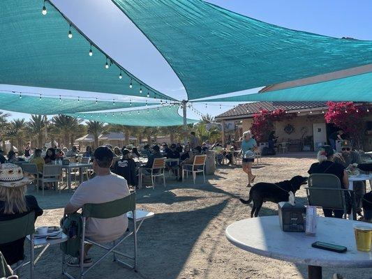 HIGH tanks Brewery Wellton, AZ - December 8, 2024 - cover seating area looking towards stage