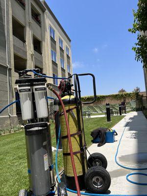 Window washing using purified water system