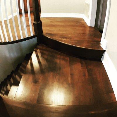 Walnut flooring with radius stair nosing