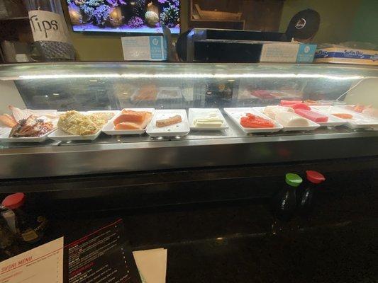 Not so appealing sushi display fridge (low quality sushi) and FRIED Chicken????