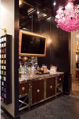 Enjoy whisky or your favorite drink from our wet bar while you shop or get fitted for a custom suit in our Uptown Dallas store.